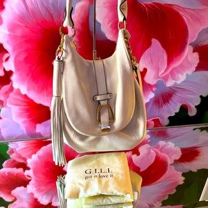 G.I.L.I Shoulder Bag, Soft Ivory Leather
Converts To Back Pack, Like New